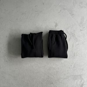 Chandal Syna largo negro y turquesa