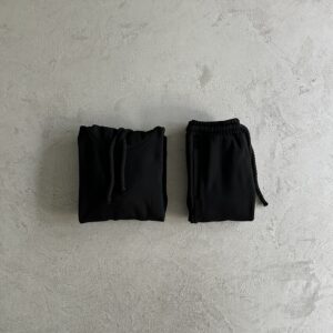 Chandal Syna largo negro y rojo